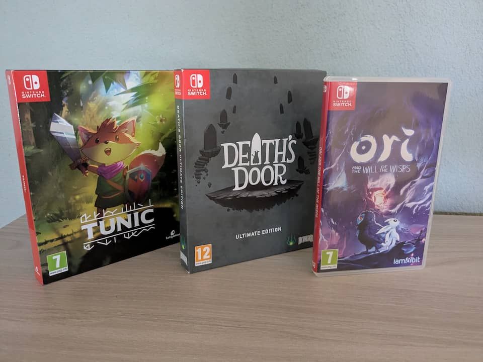 Foto delle edizioni fisiche dei tre giochi sopra menzionati